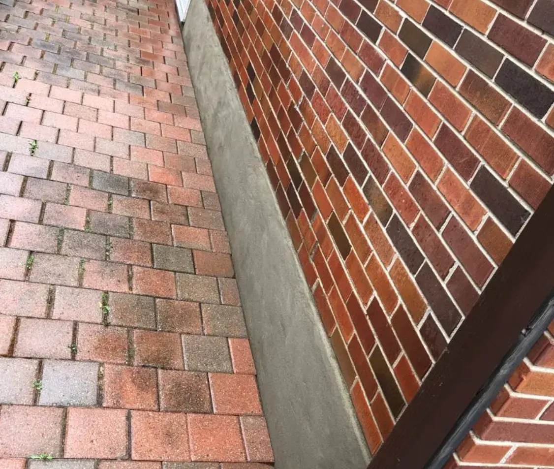 Detail of interlocking brick and paver wall