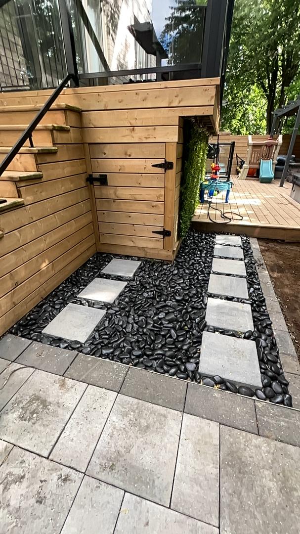 Meticulous stone steps and gravel walkway grading